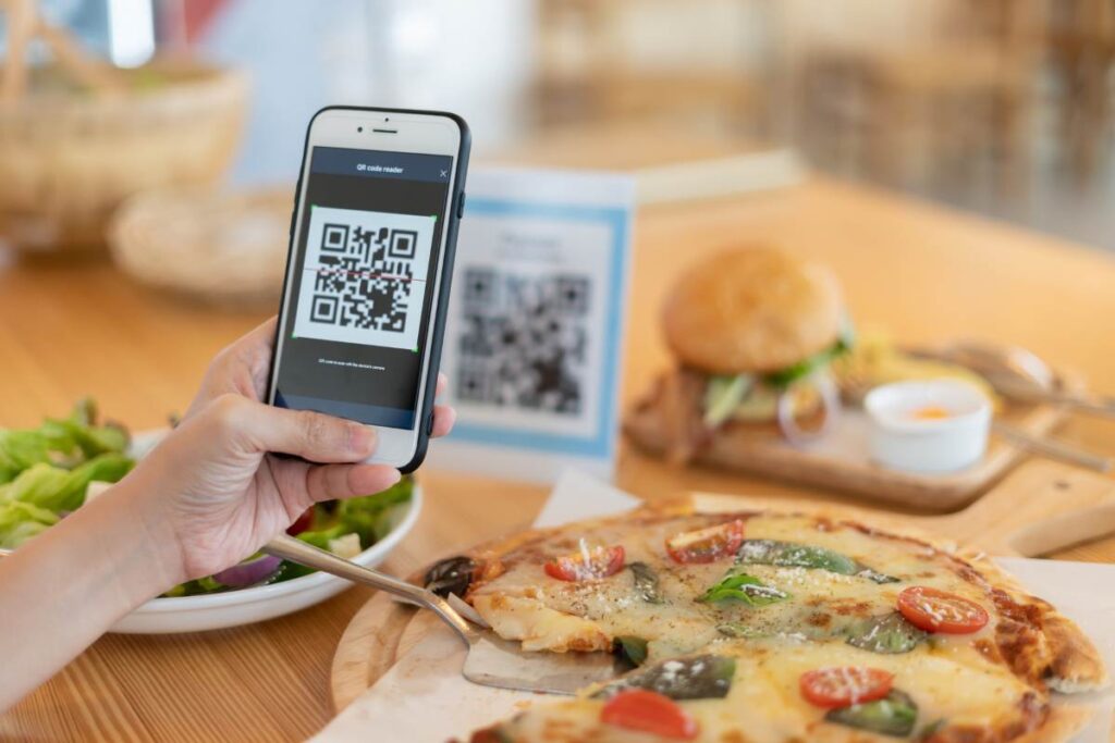 Customer using a QR code to order contactless